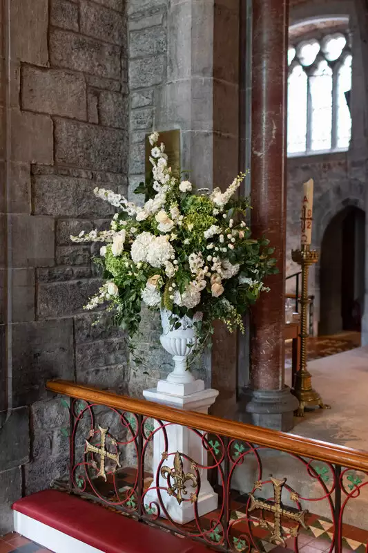 White floral arrangement for wedding ceremony in Adare planned by wedding planner Olivia Buckley International