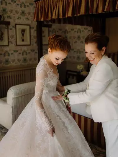 Destination wedding at Ballynahinch Castle, County Galway, Ireland — bride with her mother during bridal preparations before the ceremony inside the estate.