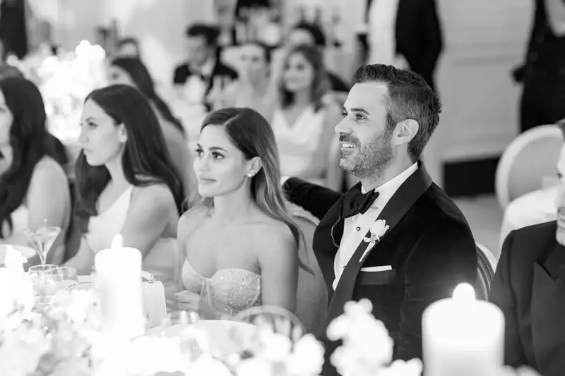 Irish destination wedding at Adare Manor, County Limerick — black and white image of the bride and groom during their wedding dinner.