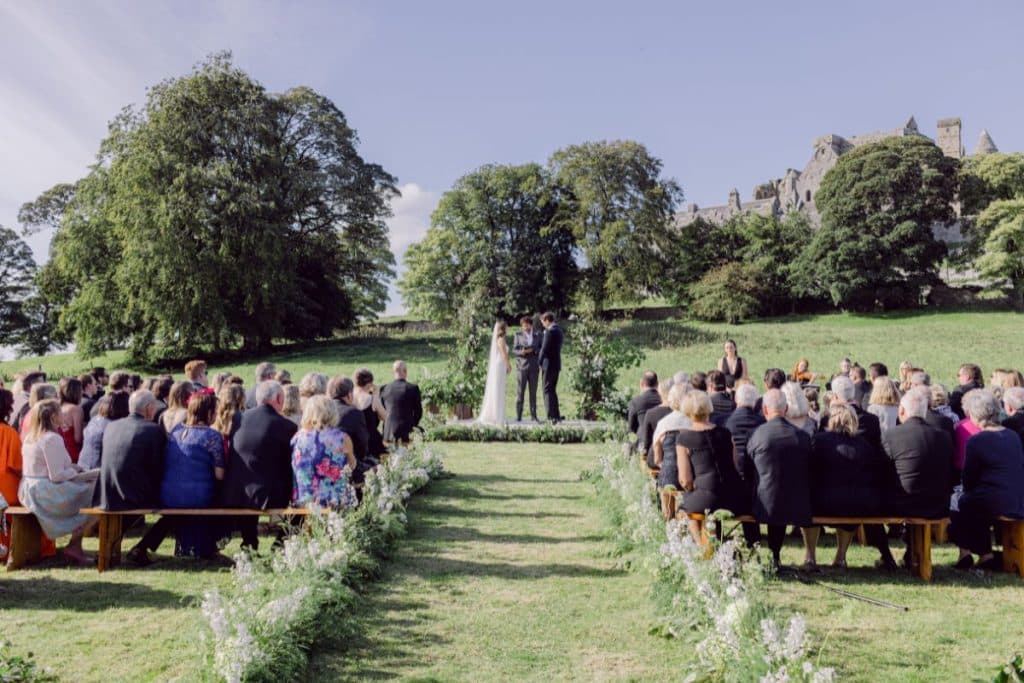 Wedding ceremony at the foothills of the Rock of Cashel, beside Cashel Palace Hotel in Ireland