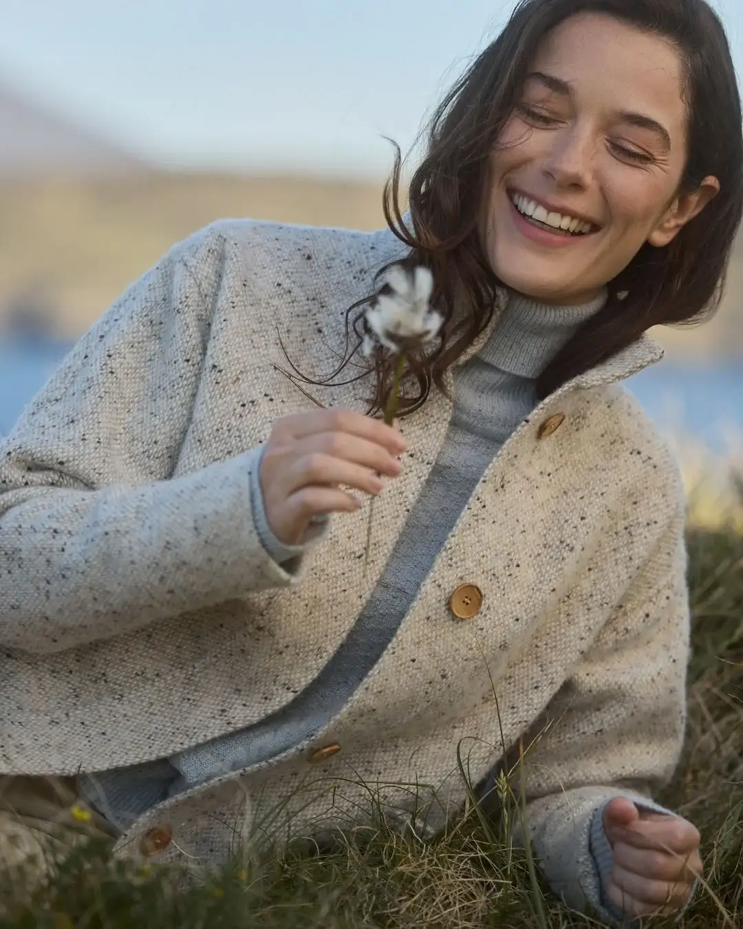 Irish heritage tailoring — white Magee 1866 tweed jacket crafted in County Donegal for luxury destination celebrations.