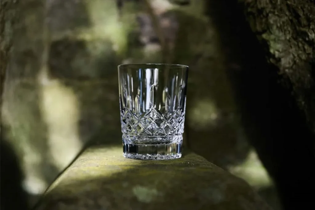 Luxury wedding design Ireland — Waterford Crystal glassware incorporated into refined tabletop styling for destination wedding receptions.