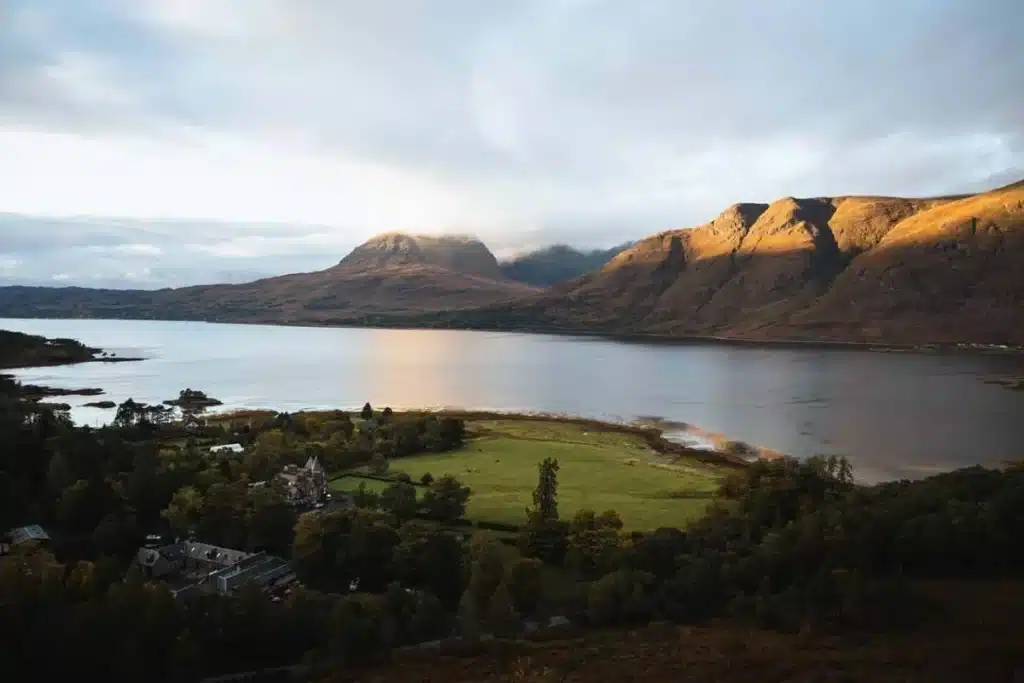 Luxury wedding destination in Scotland at The Torridon — lakeside estate overlooking the surrounding Highlands and mountain landscape.