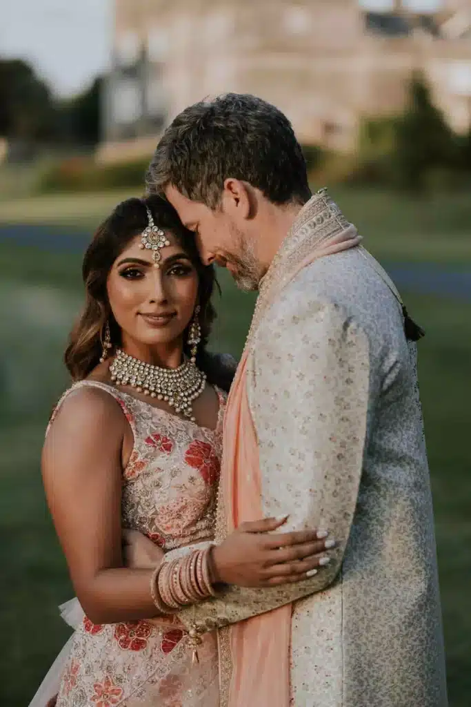Indian destination wedding in Ireland at Dromoland Castle, Co Clare — bride and groom during a Sangeet celebration ahead of the wedding weekend.