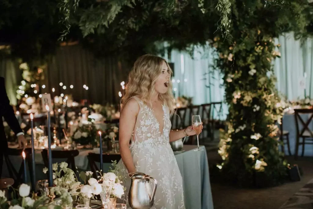 Irish destination wedding at Lough Eske Castle, County Donegal — bride viewing the ballroom wedding design before the evening celebration.
