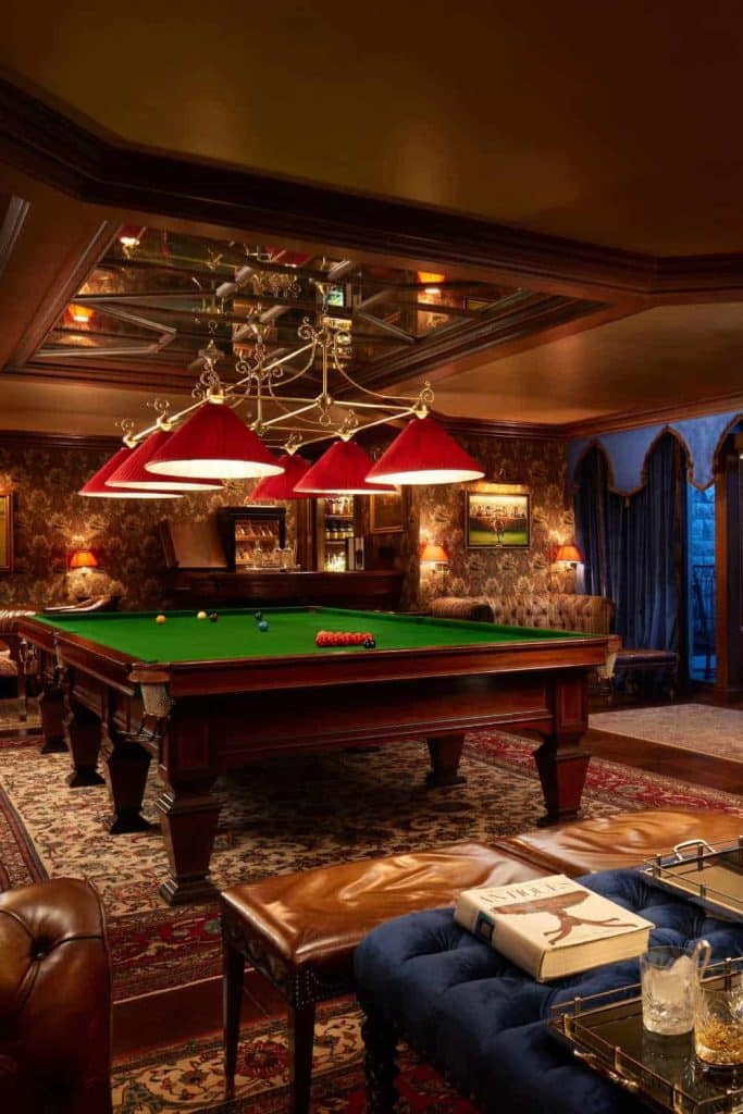 Irish castle wedding at Ashford Castle — Billiards Room with a pool table, soft lighting, and bar area within the castle interior.