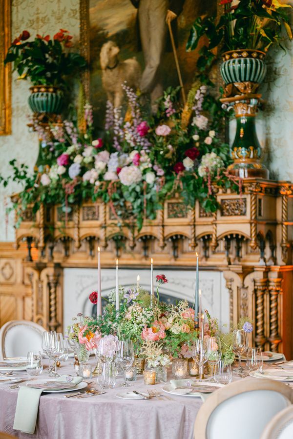 Destination wedding in Ireland at Ashford Castle, County Mayo — reception tablescape in the Connaught Room with bespoke dining and floral design.