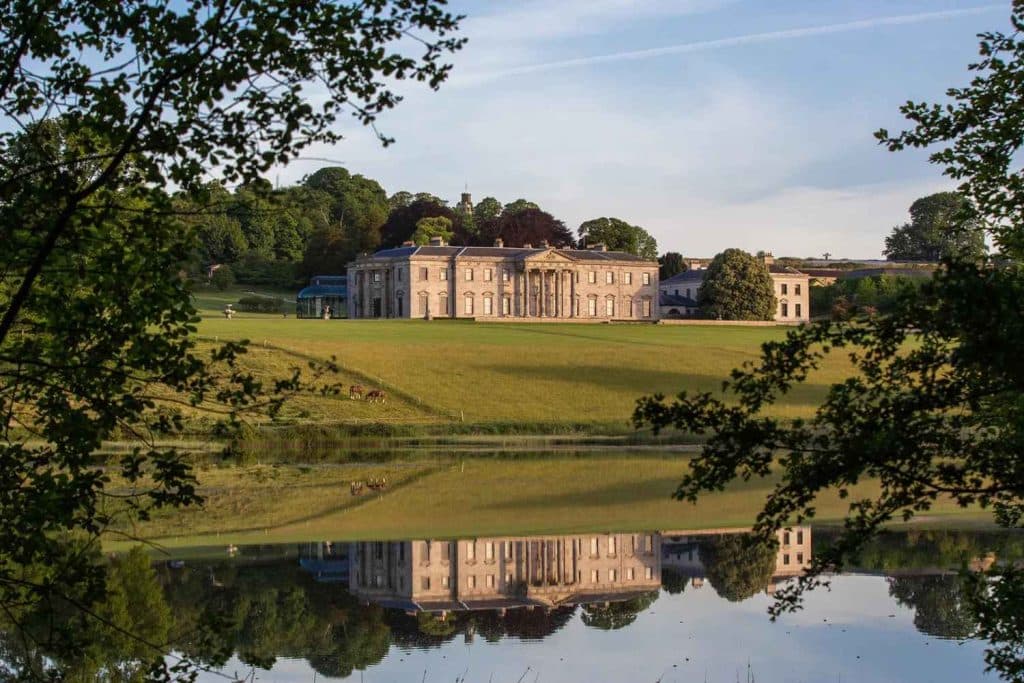 Destination wedding in Ireland at Ballyfin Demesne — view of the Regency estate and surrounding parkland.