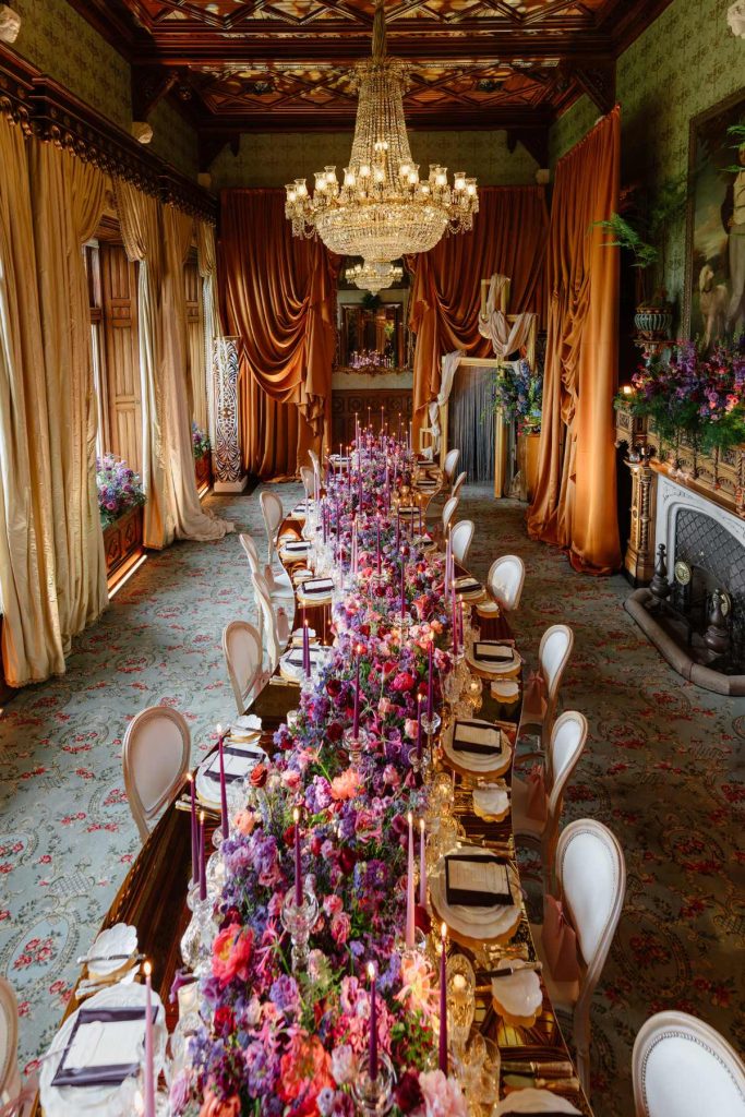 Event design Ireland at Ashford Castle, County Mayo — private dinner with a long-table tablescape, abundant florals and bespoke drapery in the Connaught Room.