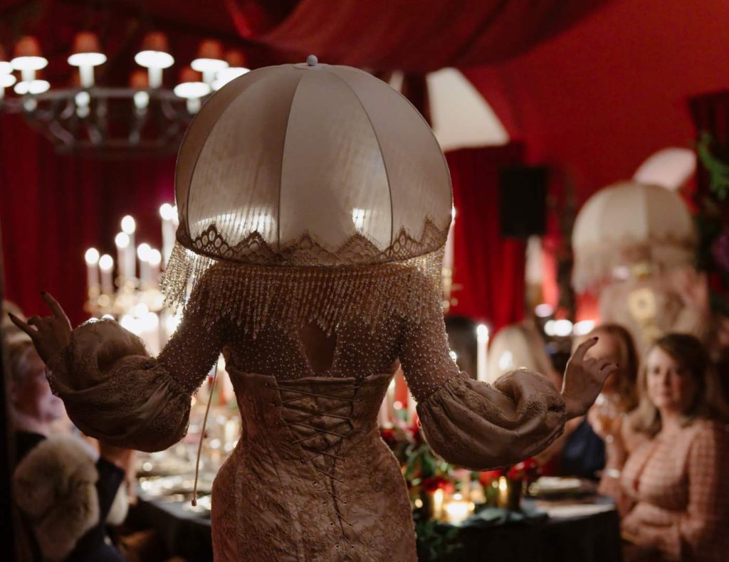 Milestone birthday celebration at Ashford Castle, County Mayo — immersive entertainment during a private dinner in the castle dungeon.