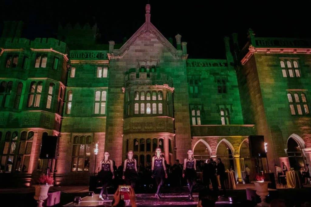 Destination I Do feature on creating thoughtful arrivals and meaningful guest experiences at the start of a destination wedding weekend, illustrated by Irish dancers performing at Adare Manor.